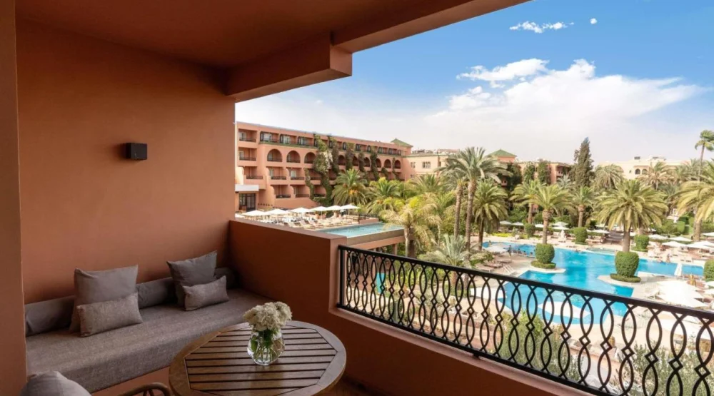 Contemporary Deluxe Room with Balcony and Pool View at Sofitel Marrakech Palais Imperial & Spa