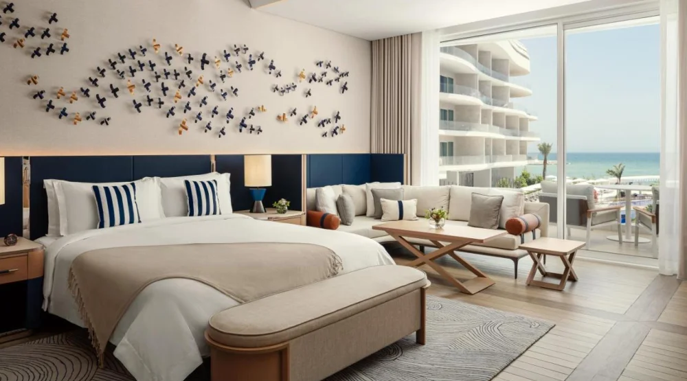 Deluxe King Room with Balcony and Sea View at The St. Regis Al Mouj Muscat Resort