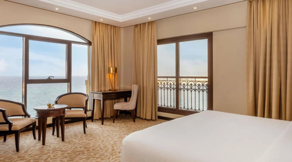 Three Bedroom Suite with One King and Two Twin Beds at Pullman Resort Al Marjan Island