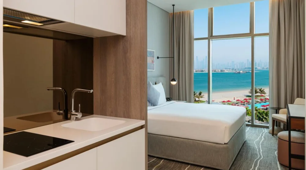 Deluxe King Room with Palm Sea View & Kitchenette at Th8 Palm Dubai Beach Resort Vignette Collection