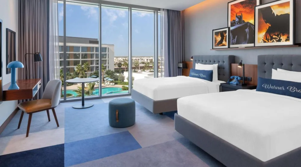 Artist Room with Two Double Beds and Pool View at The WB Abu Dhabi Curio Collection By Hilton