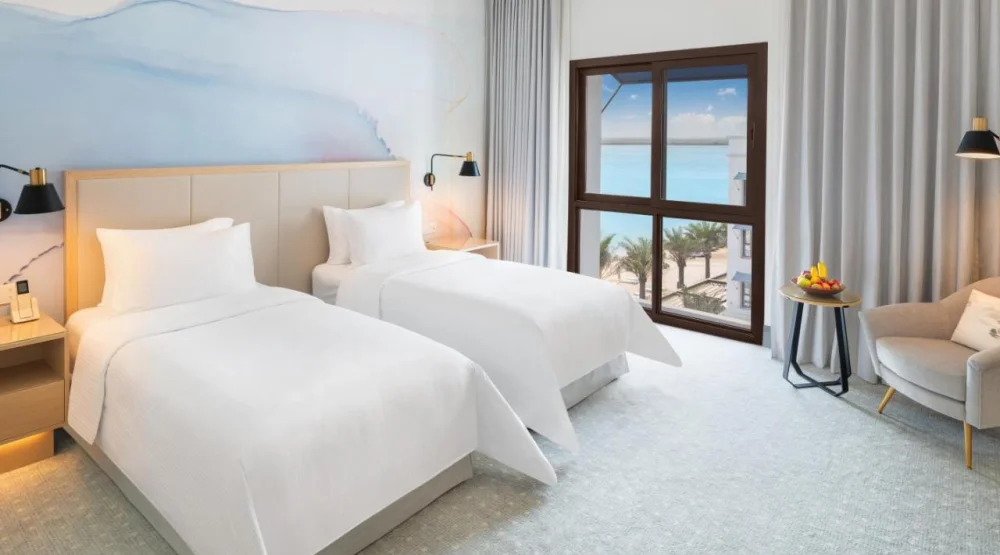 Deluxe Room Partial Sea View Twin at Vida Beach Resort