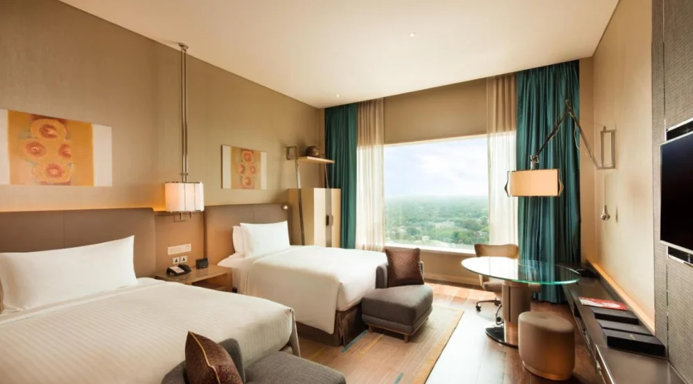 Deluxe Queen Room with Two Queen Beds at Conrad Pune