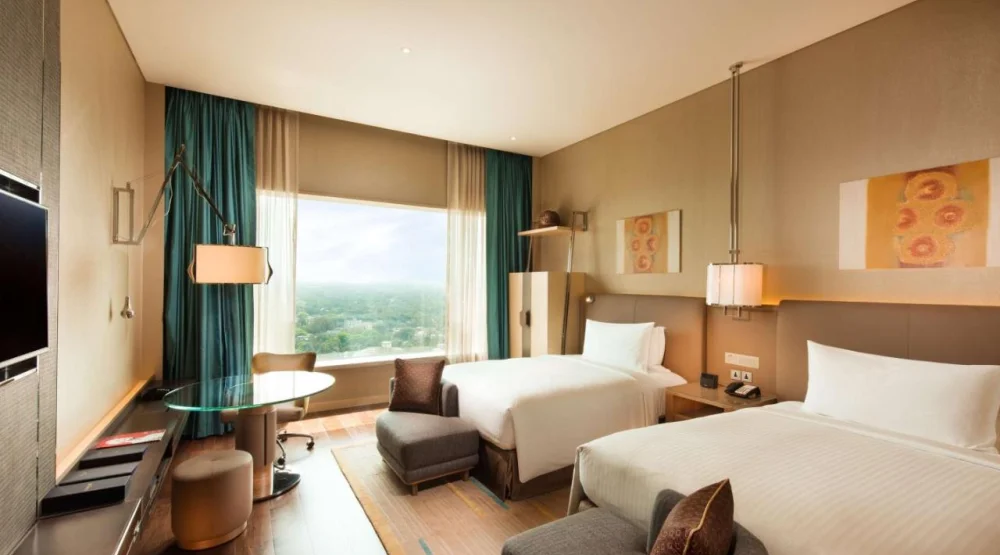 Premier Queen Room with Two Queen Beds at Conrad Pune