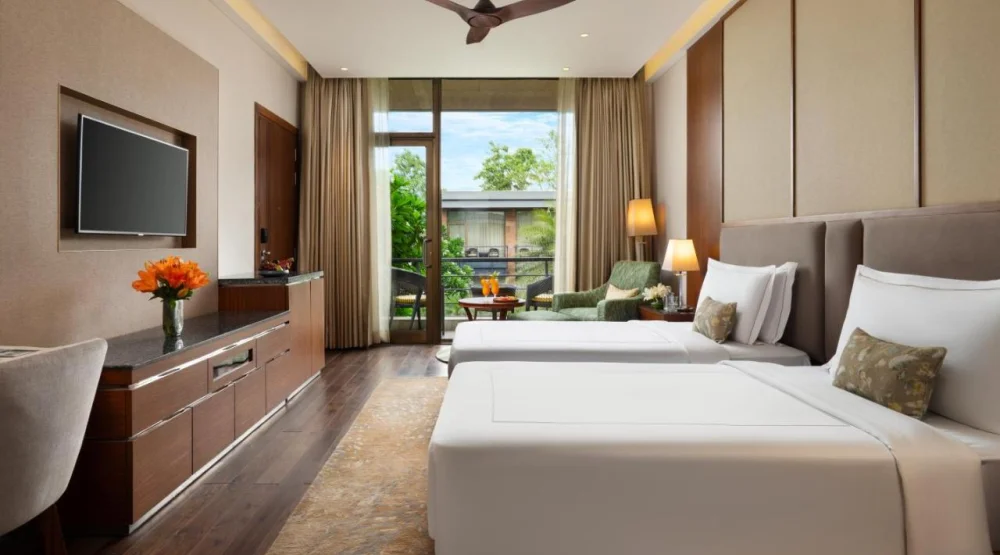 Luxury Room Courtyard View with Balcony  - Twin Bed at Taj Damdama Lake Resort & Spa Gurugram