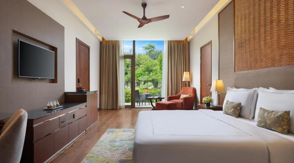Grand Luxury Room with Sit Out - King Bed at Taj Damdama Lake Resort & Spa Gurugram
