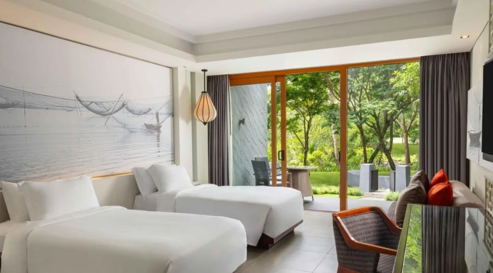 Grand Twin Room with Balcony and Garden View at Angsana Lang Co
