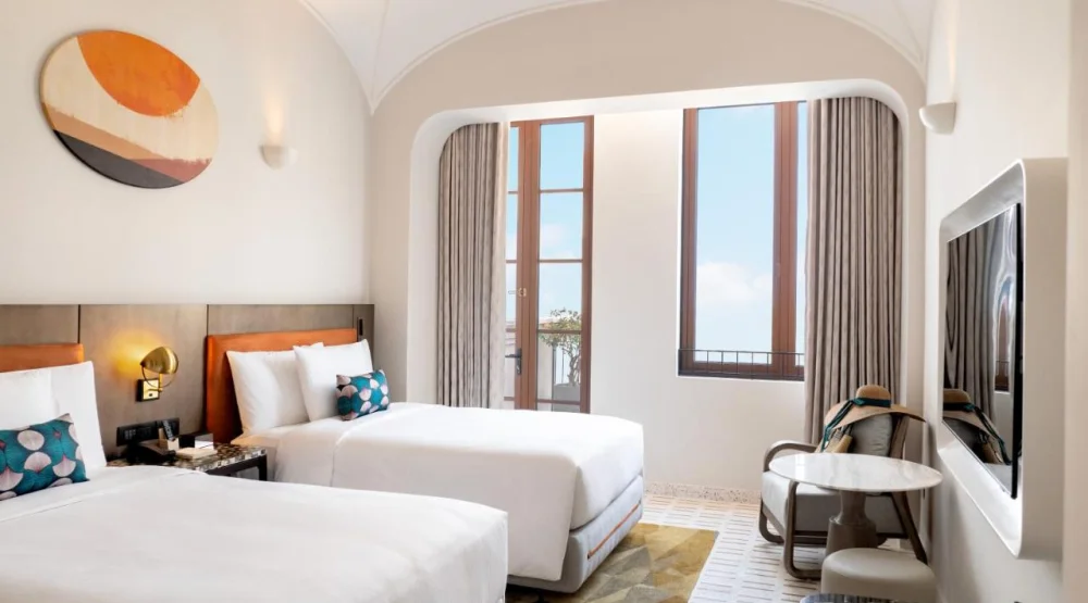 Twin Room with Balcony at La Festa Phu Quoc Curio Collection By Hilton