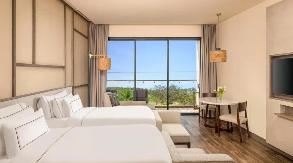 Deluxe Double Or Twin Room with Balcony - Garden View at Melia Ho Tram Beach Resort