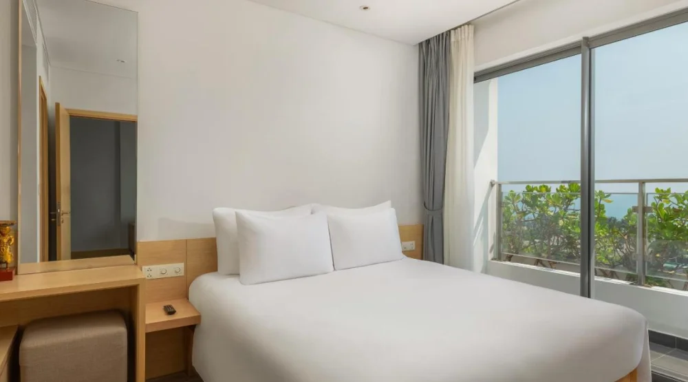 One Bedroom Apartment Partial Ocean View with Balcony at Naman Retreat