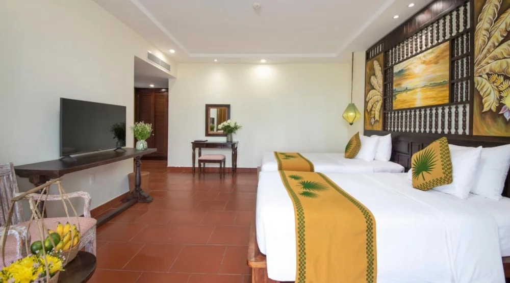 Deluxe Double Room with Garden View at Palm Garden Beach Resort & Spa