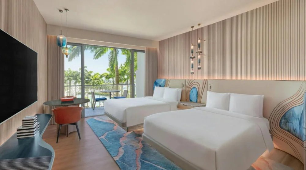 Premier Deluxe Room, Two Queen Beds, Balcony, Pool View at W Singapore Sentosa Cove