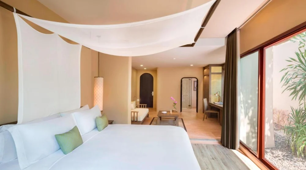 King Room with Sofa Bed at The Naka Island A Luxury Collection