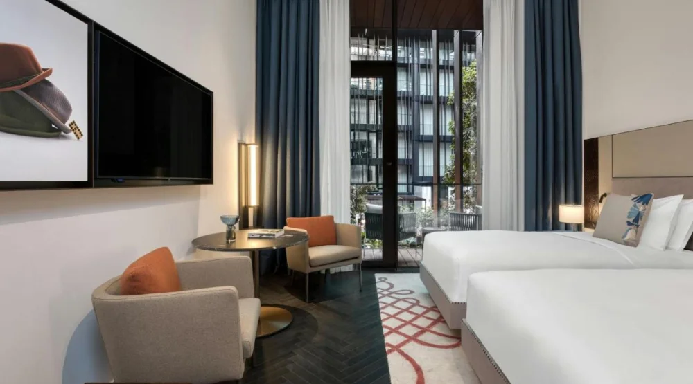 Atrium Twin Room with Two Twin Beds and Balcony - Atrium View at Dorothea Hotel Budapest Autograph Collection