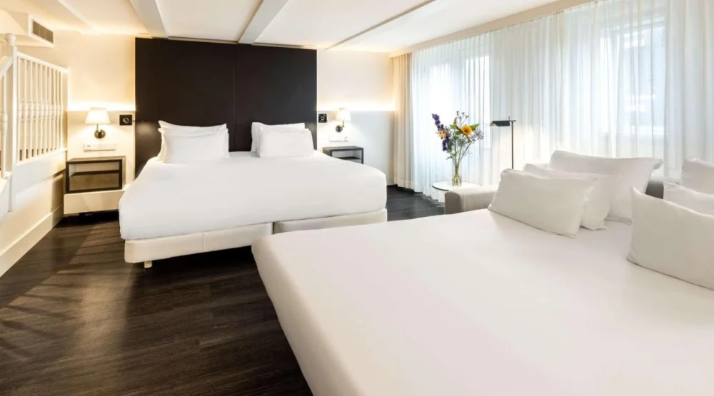 Family Room (2 Adults + Two Children) at NH Collection Amsterdam Barbizon Palace