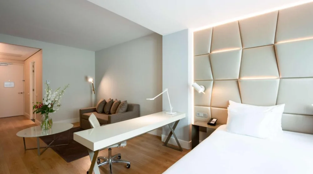 Junior Suite with Extra Bed (2 Adults + Two Children) at NH Collection Eindhoven Centre
