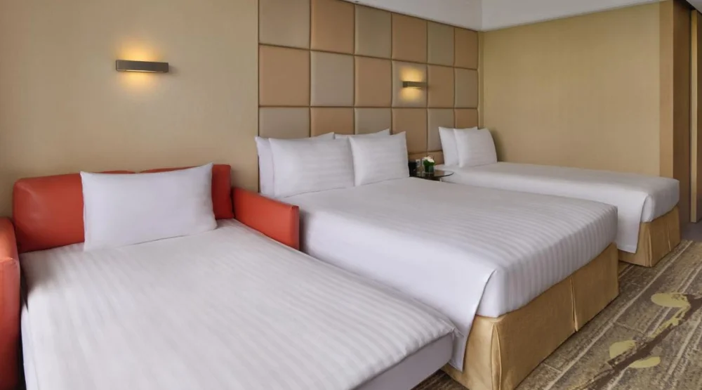 Family Queen Room with Sofa Bed and City View at The Park Lane Hong Kong Autograph Collection