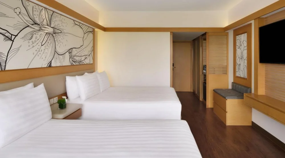 Family Queen Room with Two Queen Beds and City View at The Park Lane Hong Kong Autograph Collection