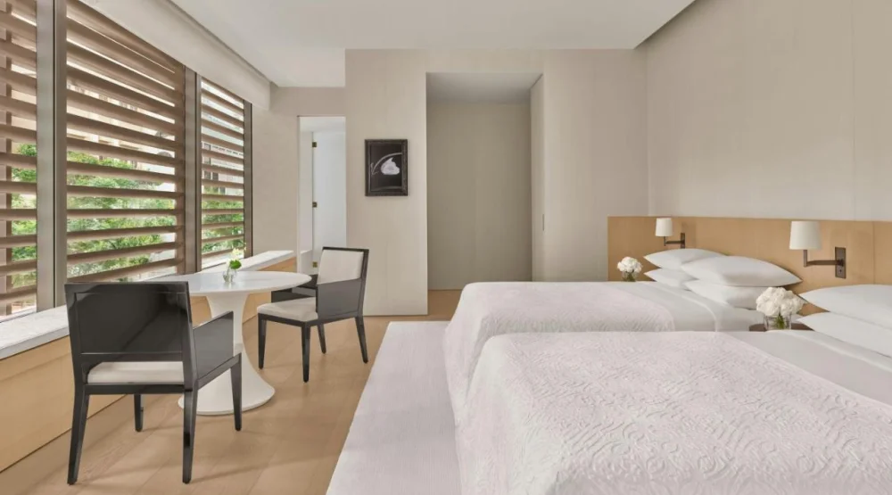 Deluxe Double, Larger Guest Room, Two Double, City View at The Singapore EDITION