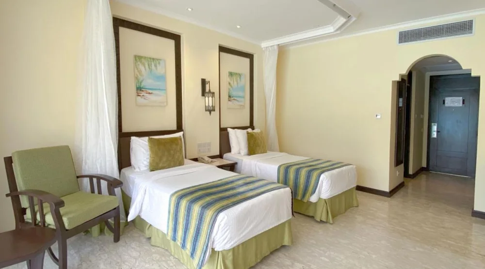 Pool Facing Twin Room at Sarova Whitesands Beach Resort & Spa