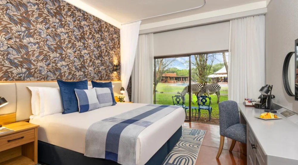 King Room with Pool View at Avani Victoria Falls Resort