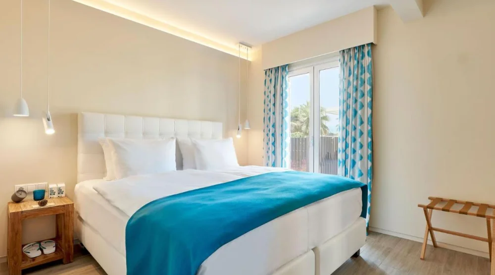 Deluxe Suite with Garden and Pool at 7pines Resort Ibiza