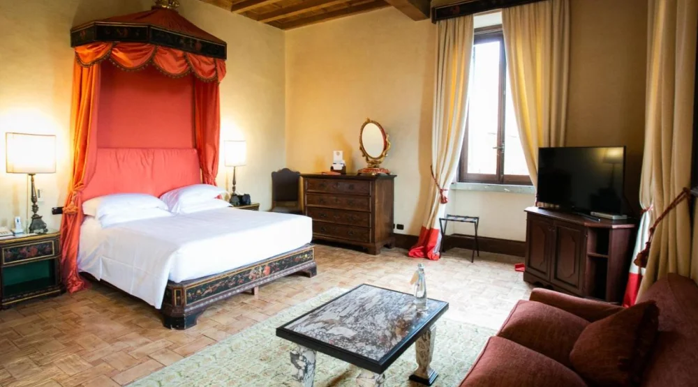 Junior Suite with Garden View at La Posta Vecchia Hotel