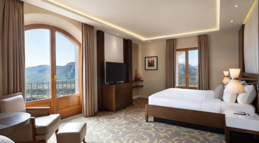 Balcony Deluxe Suite King Room with View at Renaissance Tuscany Il Ciocco Resort & Spa