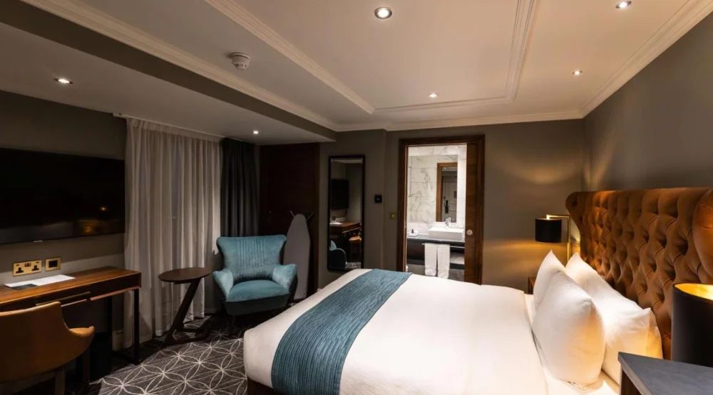 Deluxe Atrium Queen Room at 100 Queen's Gate Hotel London, Curio Collection by Hilton