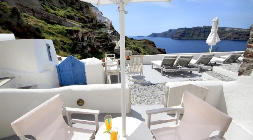 Two Bedroom Cave Suite with Caldera & Sea View at Oia Mare Villas
