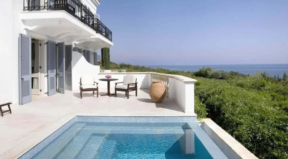 Interconnecting Junior Suite with Pool and Garden Studio with Sea View at Anassa