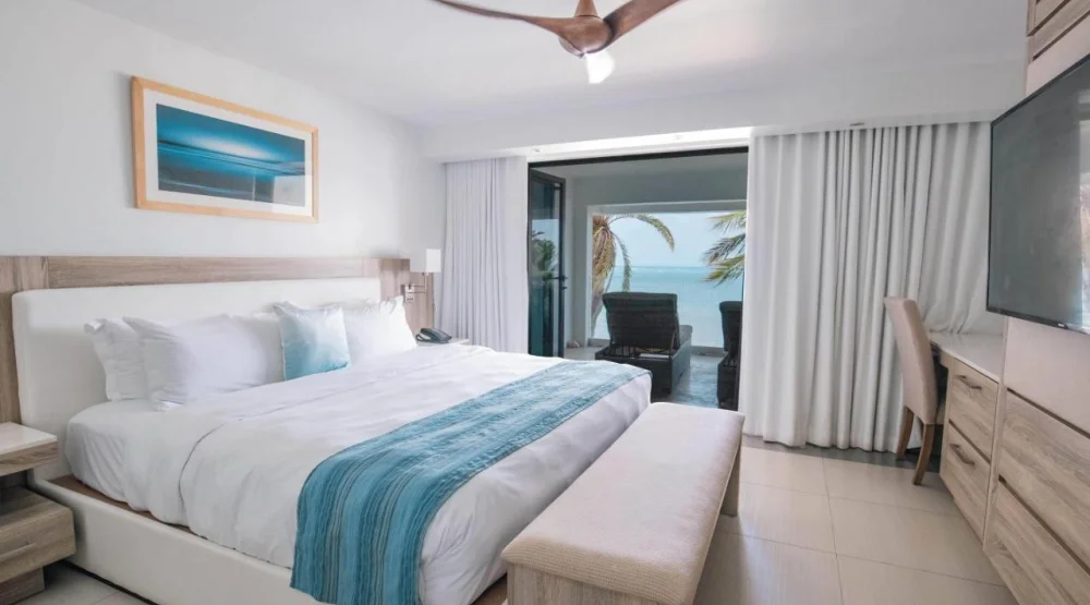 2-bedroom Oceanfront Suite W/ Kitchen, One King Bed, Two Twin Beds, Non-smoking at Hodges Bay Resort & Spa