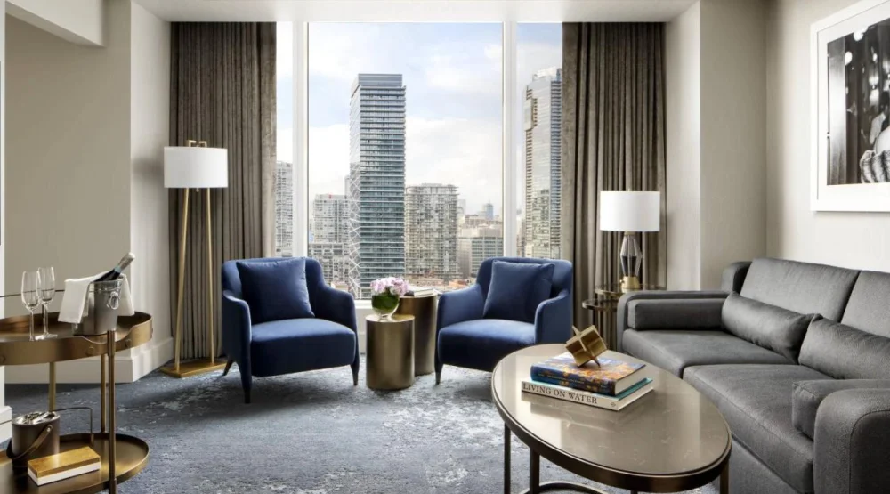 One Bedroom Corner Suite City View - One King Bed, Living Room with Sofabed at The Ritz-Carlton Toronto