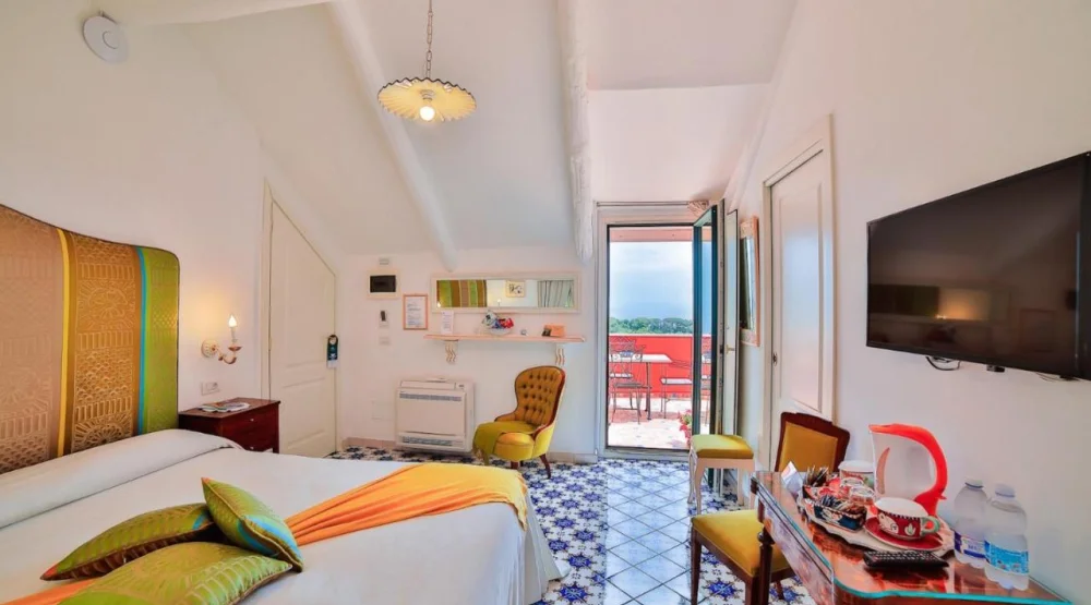 Deluxe Suite with Balcony and Sea View at Palazzo Pascal