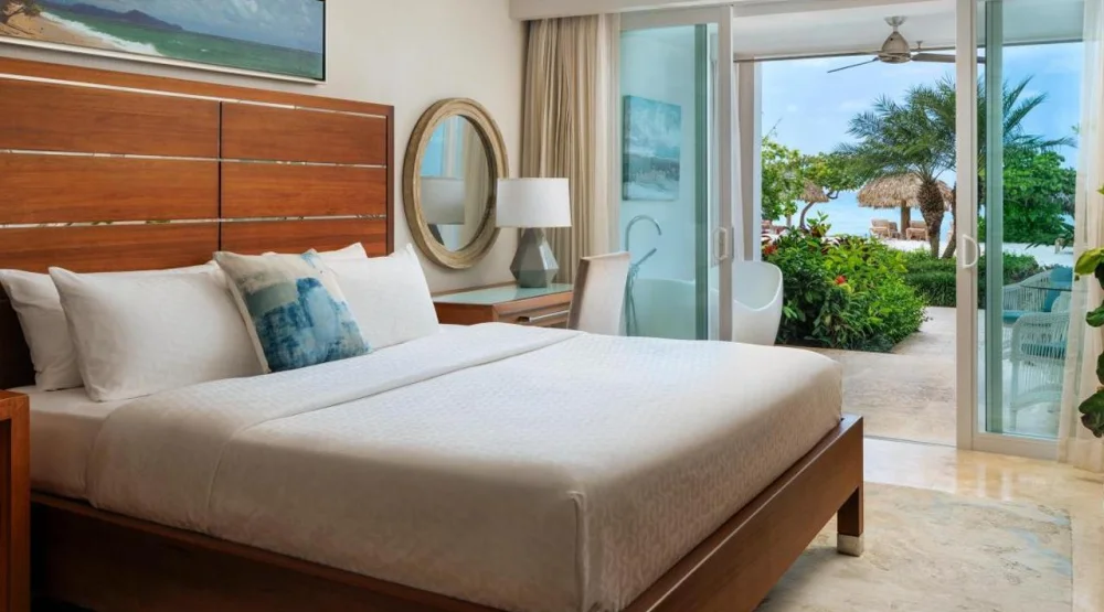 Beachfront Honeymoon Walkout Club Elite Junior Suite W/ Patio Tranquility Soaking Tub at Sandals Montego Bay