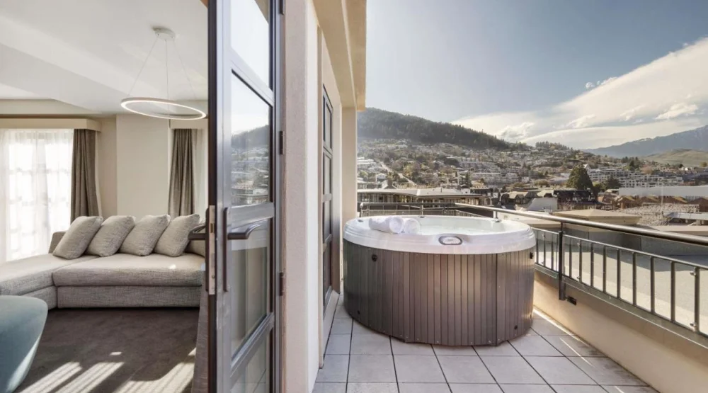 Opera King Suite with Patio and Outdoor Jacuzzi - Lake View. at Sofitel Queenstown Hotel & Spa